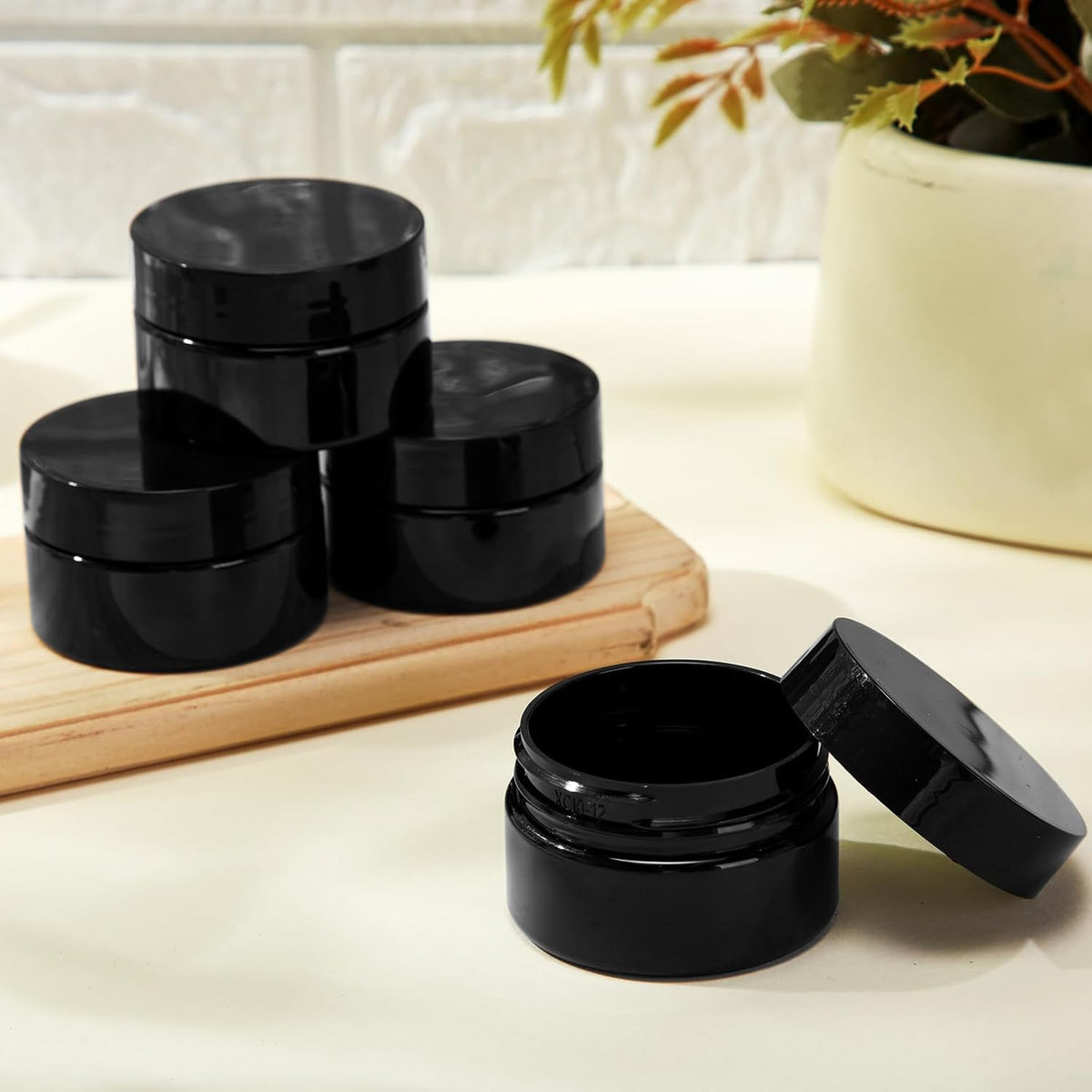 Patelai 4 Pieces Round Wide-mouth Leak Proof Plastic Container Jars with Lids for Travel Storage Makeup Beauty Products Face Creams Oils Salves Ointments DIY Making(1 Ounce,Pure Black)