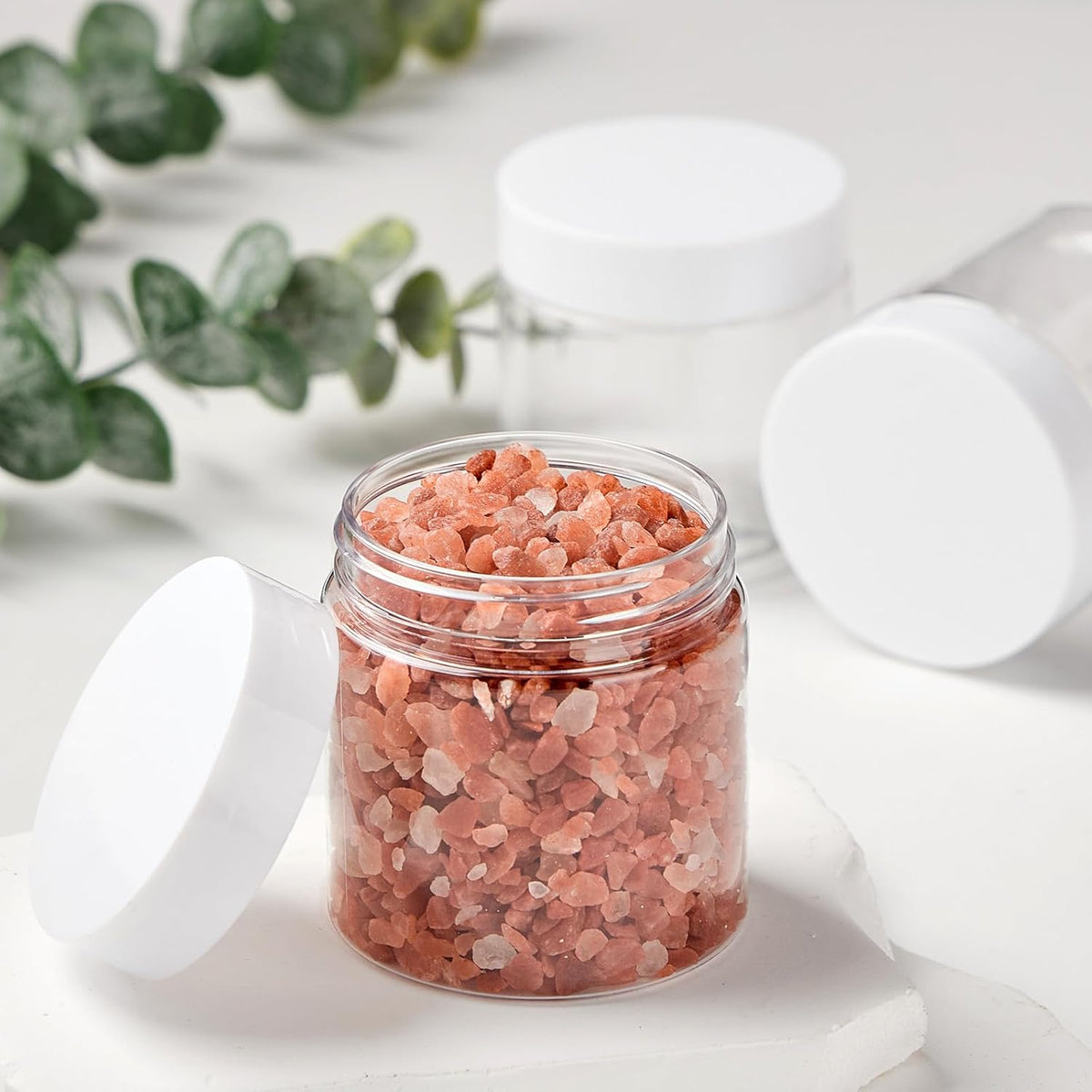 TUZAZO 24 Pack 2 Oz Small Plastic Container Jars with Lids and Labels BPA Free, Empty Round Clear Cosmetic Containers Plastic Slime Jars for Lotion, Cream, Ointments, Samples, Travel Storage (24)